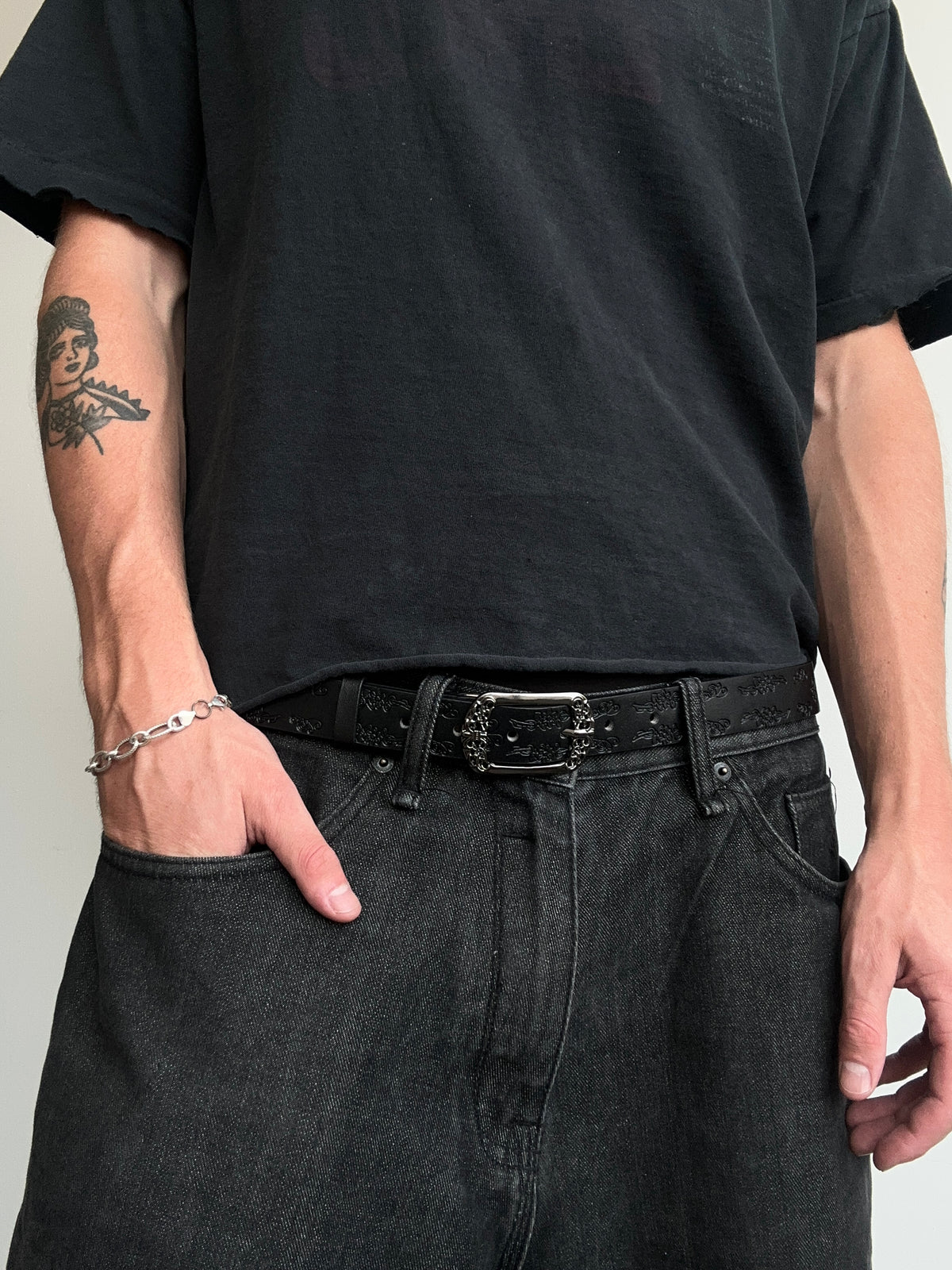 Black Floral Embossed Belt with Ornate Silver Buckle